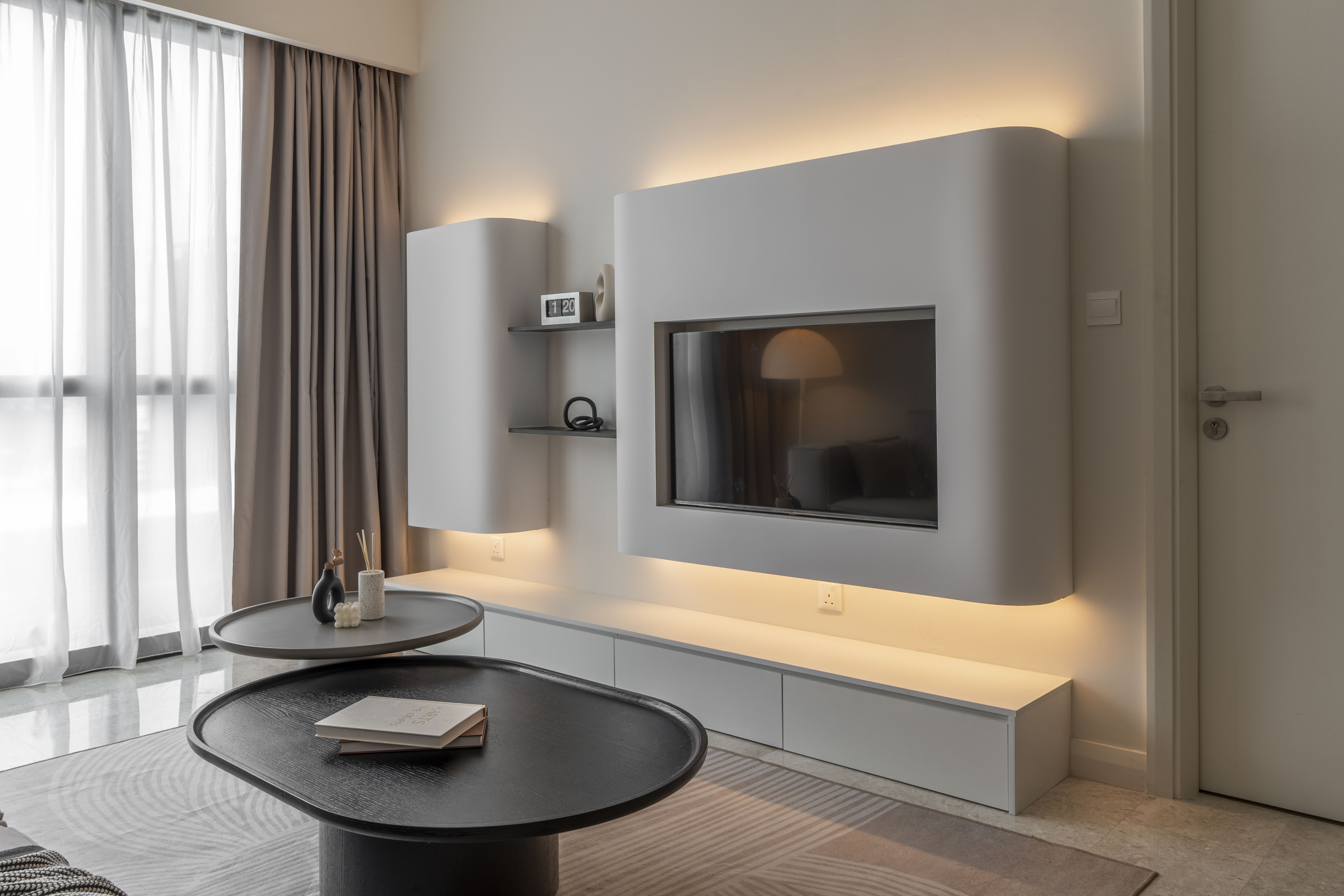 Backlit television wall with floating storage at TRX Residence, Unit 01