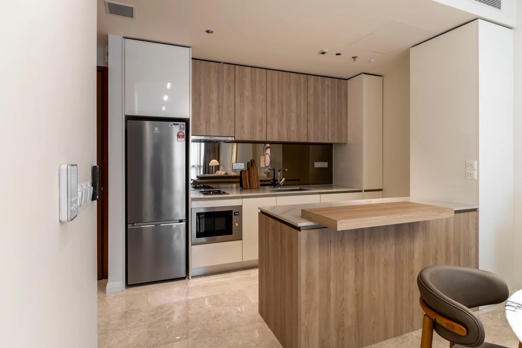 Kitchen cabinets and island at TRX Residence Home 01