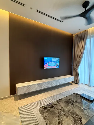Manor KLCC — Collection B interior photo of TV cabinet, feature wall, curtain, ceiling in living
