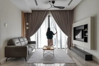 Manor KLCC — Collection A interior photo of sofa, TV cabinet, curtain, feature wall, ceiling in living