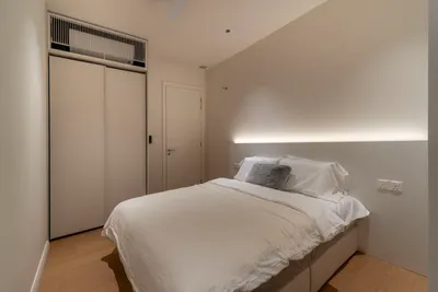 TRX Residence — Home 01 interior photo of bed frame, wardrobe, feature wall in bedroom
