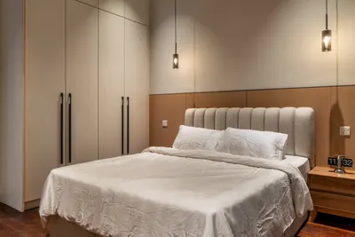 Manor KLCC — Collection A interior photo of wardrobe, bed frame, feature wall in master bedroom, bedroom