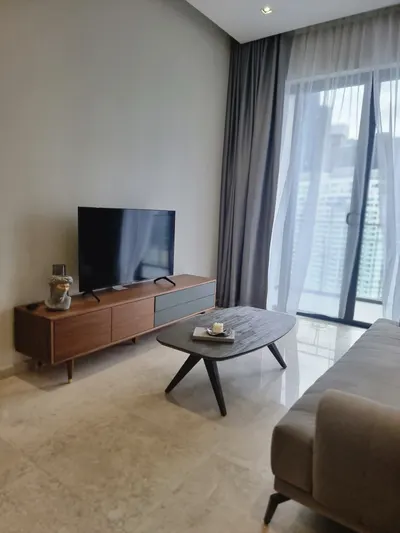 Manor KLCC — Collection D interior photo of TV cabinet, sofa, curtain, sliding door in living