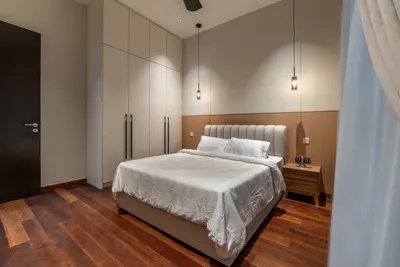 Manor KLCC — Collection A interior photo of wardrobe, bed frame, feature wall, curtain, ceiling in master bedroom, bedroom