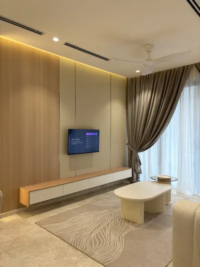 Manor KLCC — Collection C interior photo of TV cabinet, feature wall, curtain, ceiling in living