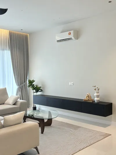 Pavilion Mayfair interior photo of TV cabinet, sofa, curtain, ceiling in living