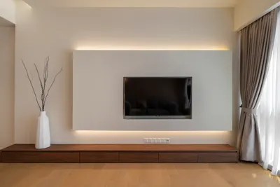 TRX Residence — Home 02 interior photo of TV cabinet, feature wall, curtain in living