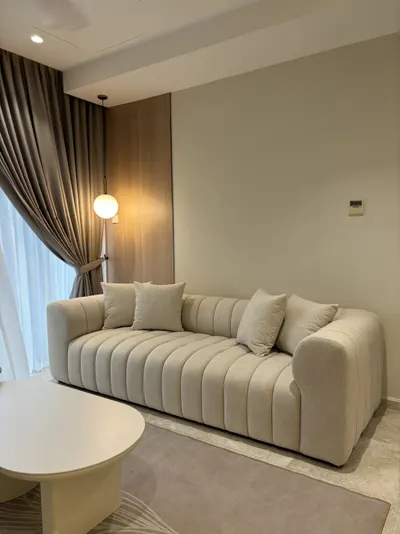 Manor KLCC — Collection C interior photo of sofa, curtain, feature wall, ceiling in living