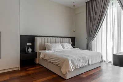Manor KLCC — Collection A interior photo of bed frame, curtain, feature wall in master bedroom, bedroom