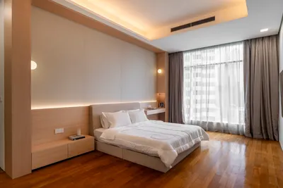 Quadro interior photo of bed frame, feature wall, curtain, ceiling in master bedroom