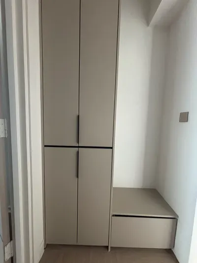 KiaraVille interior photo of shoe cabinet in living
